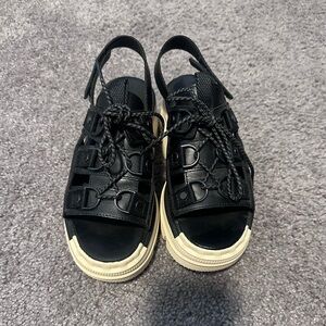 Sorel Black Lace-Up Platform Sandals with Cream Sole